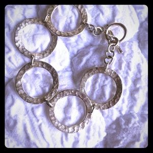 Hammered silver bracelet.